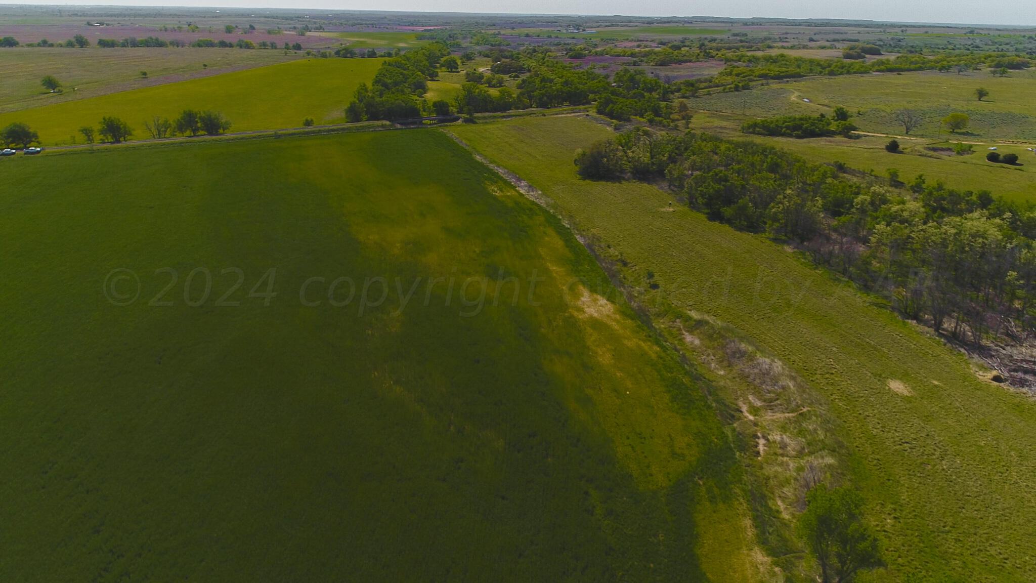 Long Dry Creek Shamrock, TX 79079 - Photo 7 of 13 a view of a lake with a city
