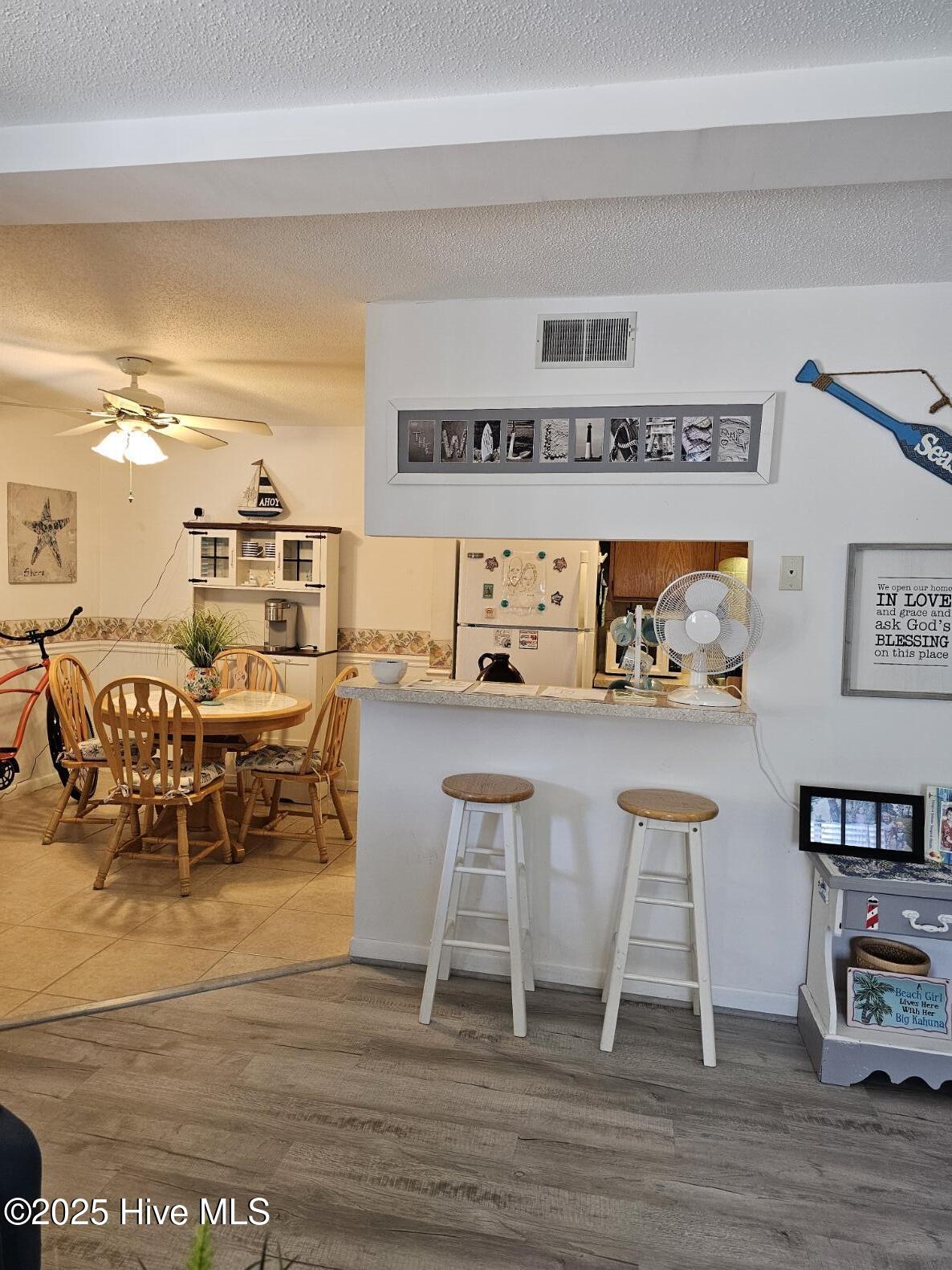 10172 Beach Drive Southwest, Unit 2206 Calabash, NC 28467 - Photo 15 of 53 Nice Flow Into Dining Area