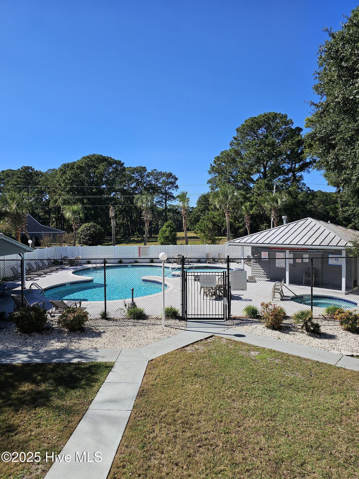 10172 Beach Drive Southwest, Unit 2206 Calabash, NC 28467 - Photo 38 of 53 Community Pool Pathway