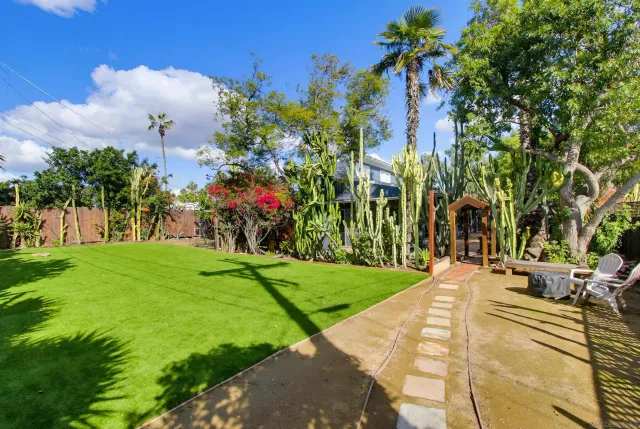 front view of a house with a garden