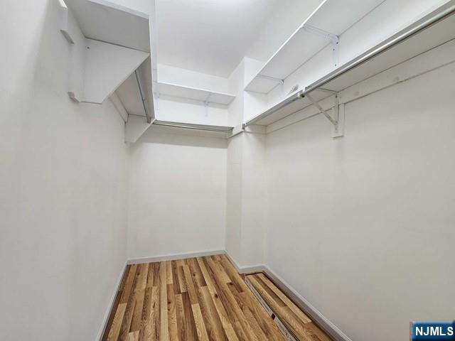 26 7th Street, Unit B Cresskill, NJ 07626 - Photo 16 of 26 a view of a room with racks on the wall