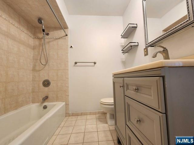 26 7th Street, Unit B Cresskill, NJ 07626 - Photo 20 of 26 a bathroom with a sink a toilet and shower