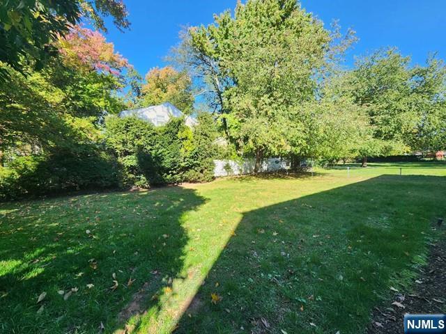 26 7th Street, Unit B Cresskill, NJ 07626 - Photo 23 of 26 a view of yard with green space