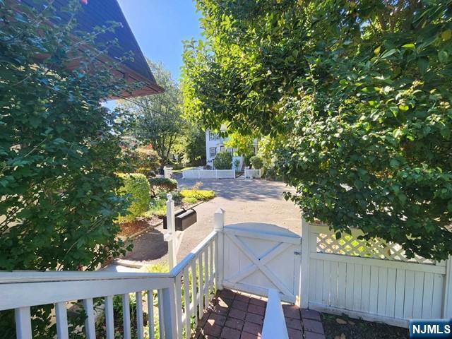 26 7th Street, Unit B Cresskill, NJ 07626 - Photo 25 of 26 a view of yard with deck and trees