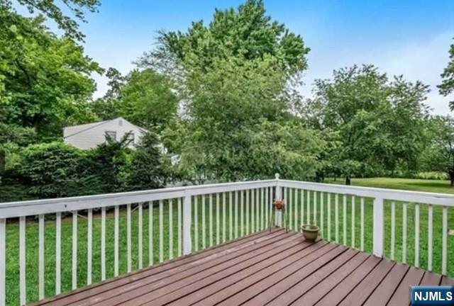 26 7th Street, Unit B Cresskill, NJ 07626 - Photo 4 of 26 a view of balcony with wooden floor and fence