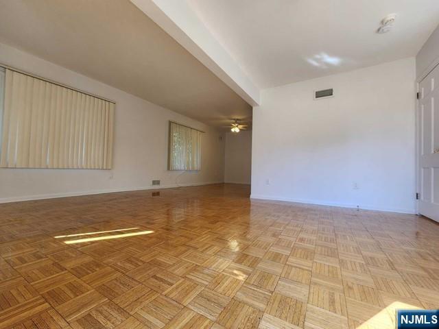 26 7th Street, Unit B Cresskill, NJ 07626 - Photo 6 of 26 a view of a livingroom with an empty space and a window
