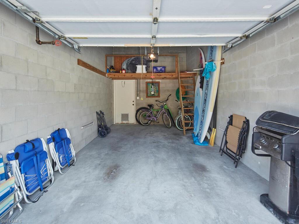415 10th Avenue South, Unit 7 Naples, FL 34102 - Photo 14 of 15 a view of a room with gym equipment