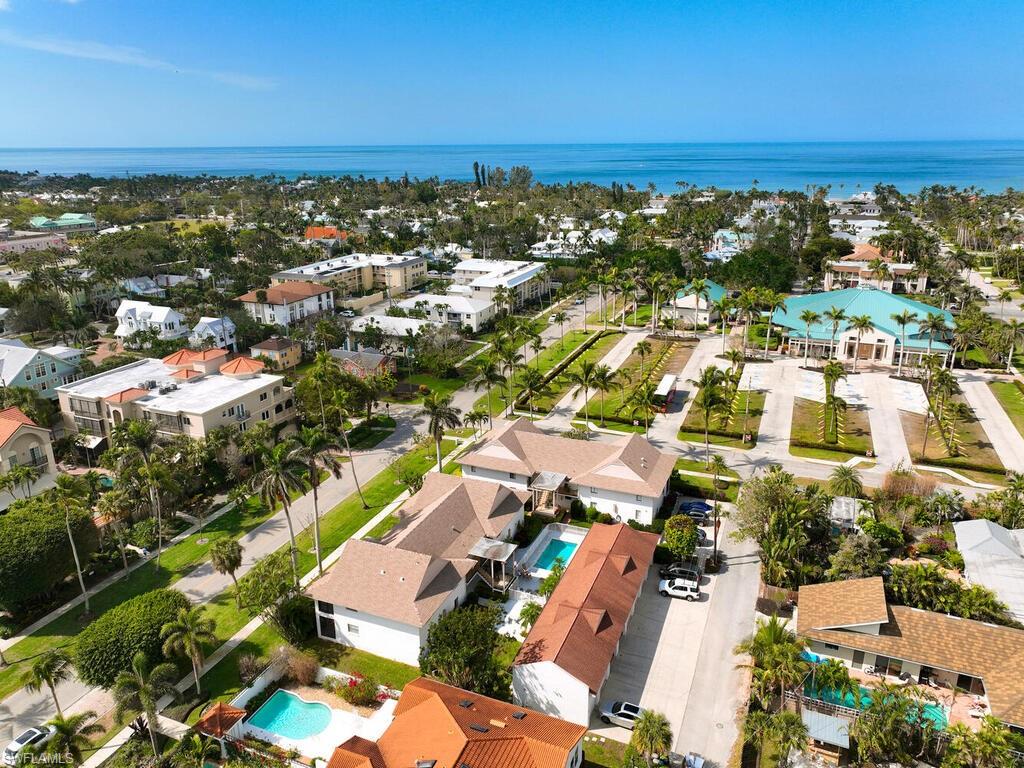 415 10th Avenue South, Unit 7 Naples, FL 34102 - Photo 2 of 15 an aerial view of residential building with parking