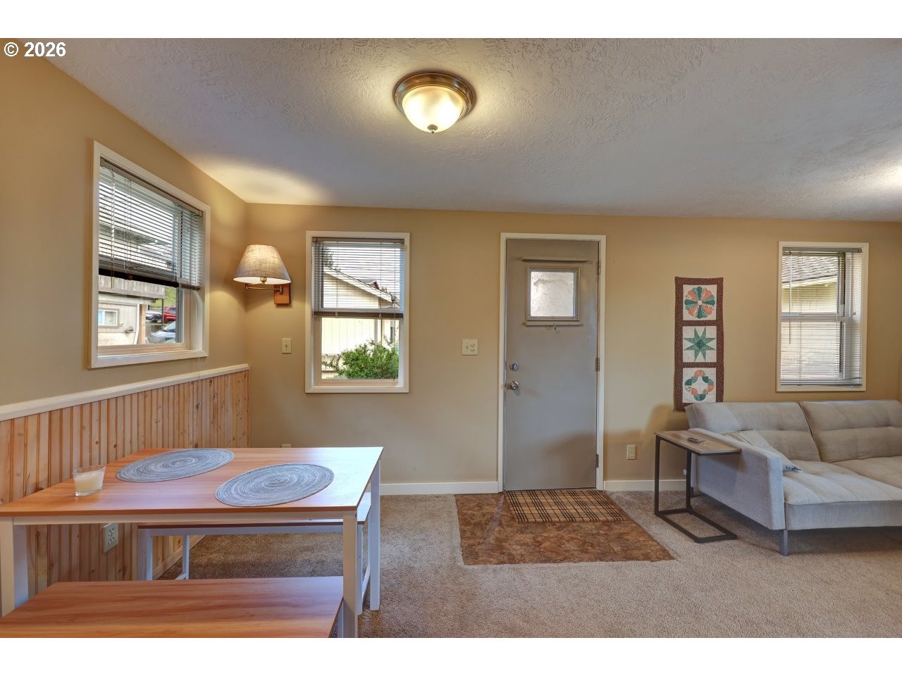1449 9th Street Astoria, OR 97103 - Photo 4 of 20 a living room with furniture and a window