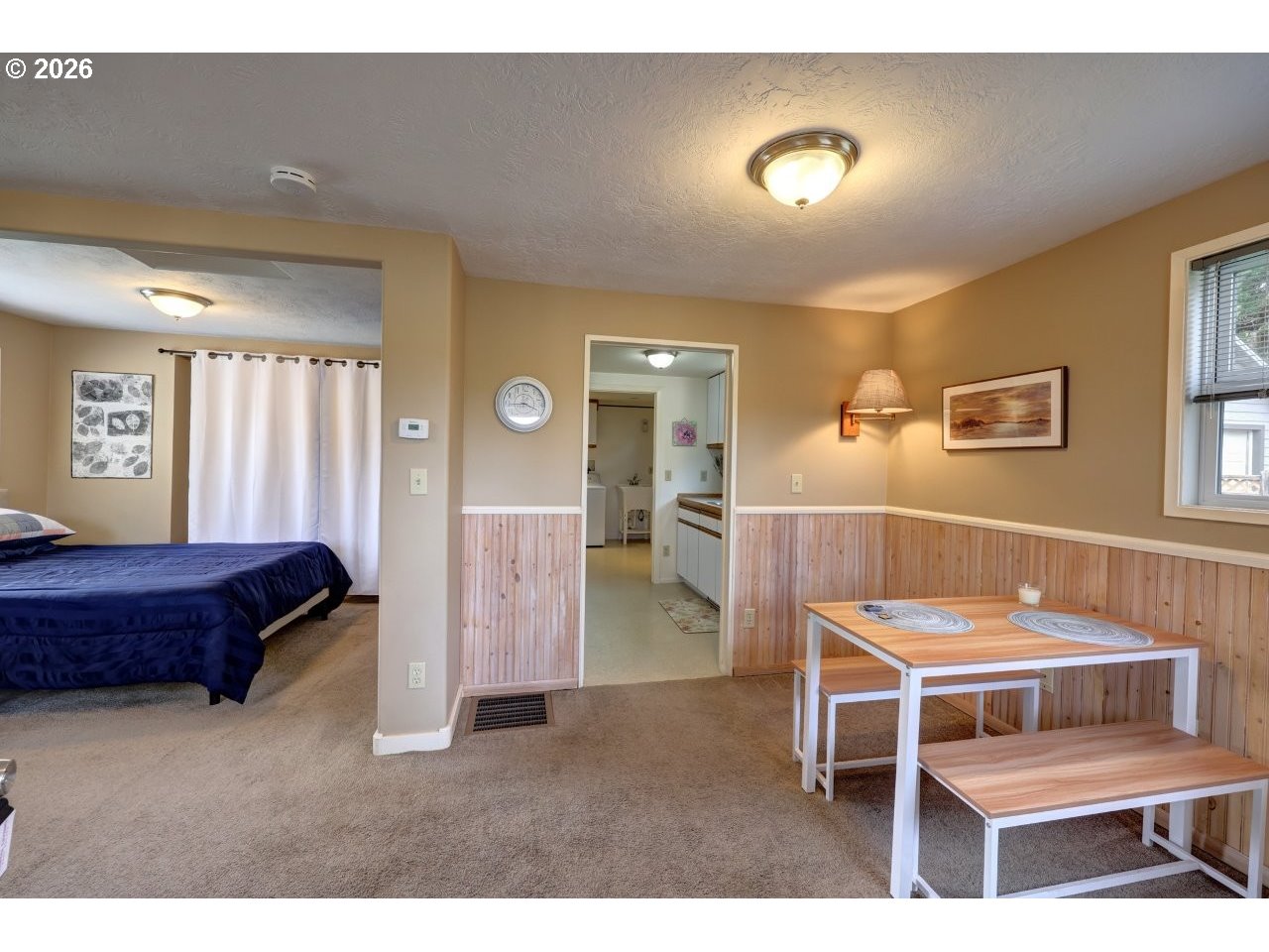 1449 9th Street Astoria, OR 97103 - Photo 5 of 20 a room with furniture and a table