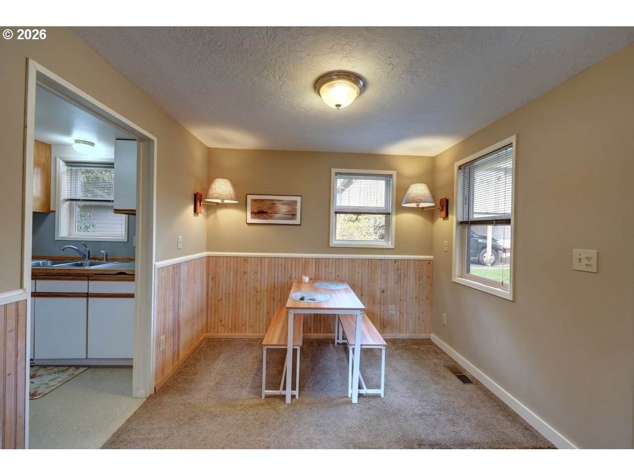 1449 9th Street Astoria, OR 97103 - Photo 8 of 20 a dining room with a sink and breakfast area