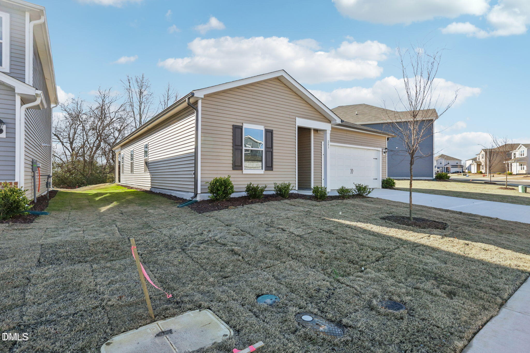 283 White Birch Lane Angier, NC 27501 - Photo 12 of 12 a view of a house with a back yard