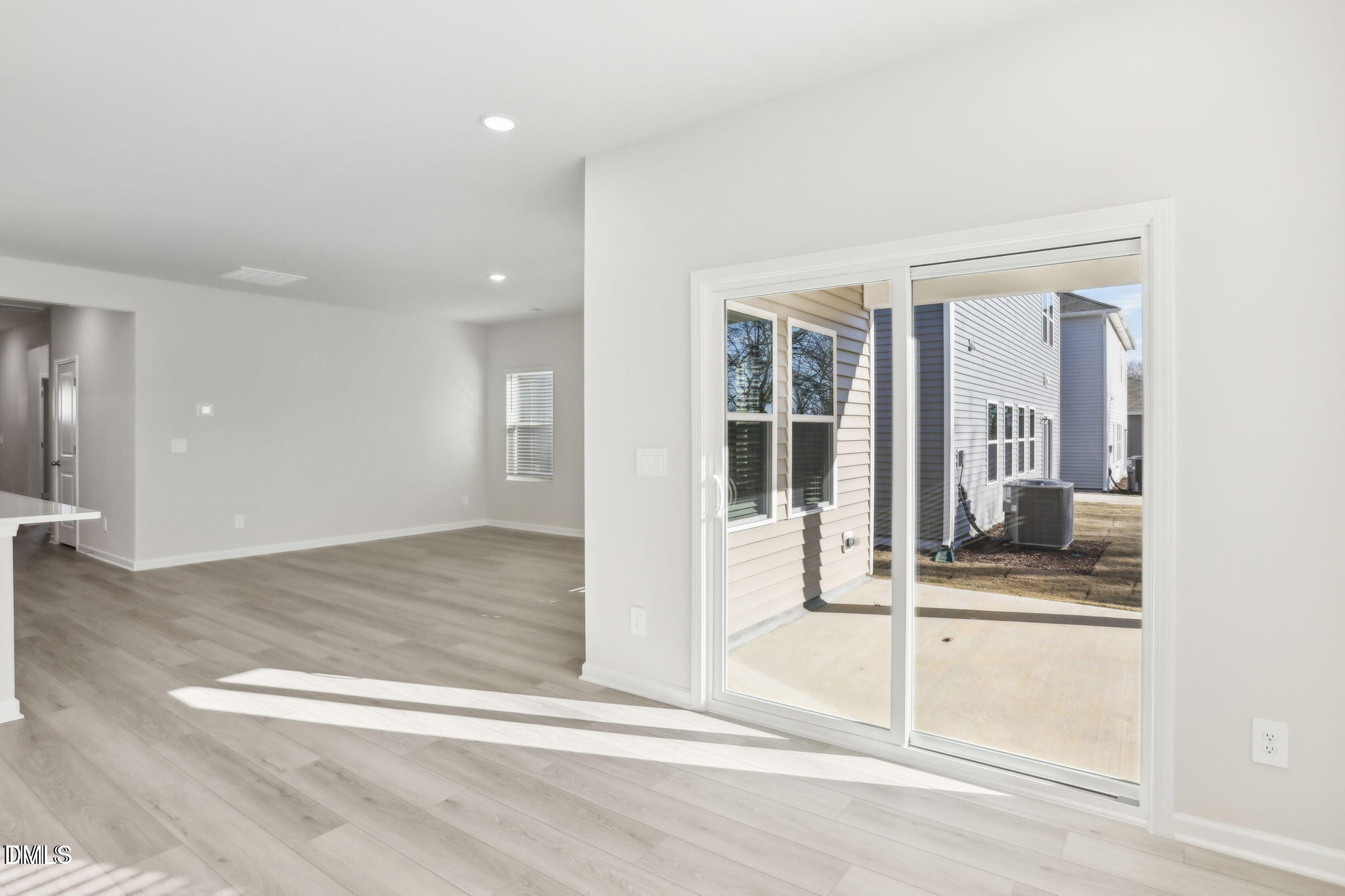 283 White Birch Lane Angier, NC 27501 - Photo 6 of 12 wooden floor and window in a room