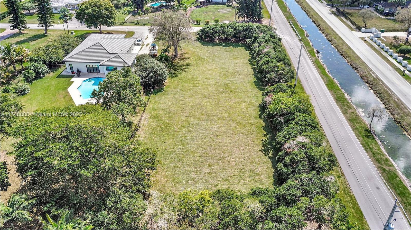 28 Sw Street Davie, FL 33330 - Photo 1 of 11 an aerial view of residential house with an outdoor space