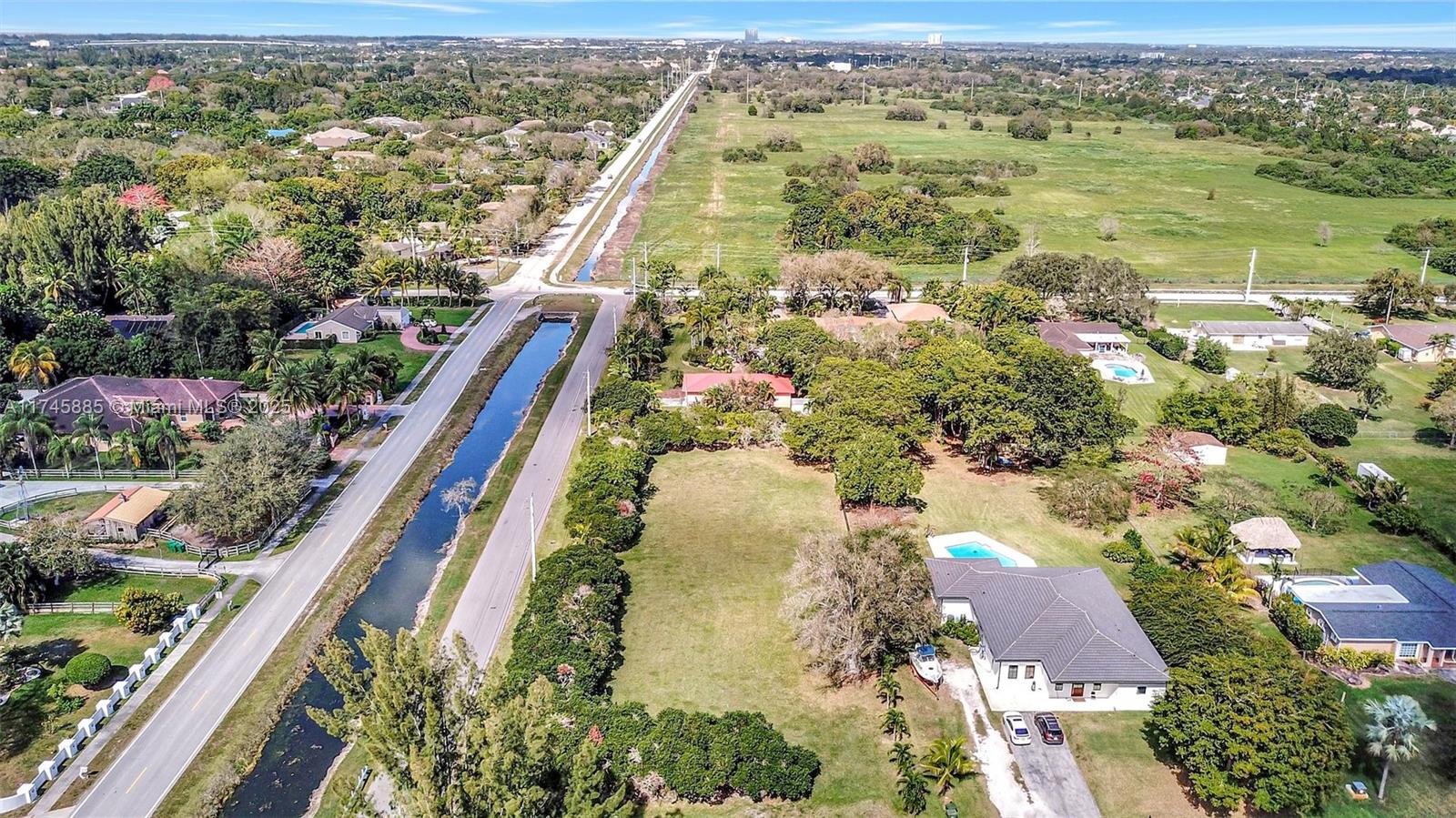 28 Sw Street Davie, FL 33330 - Photo 5 of 11 an aerial view of residential houses with outdoor space