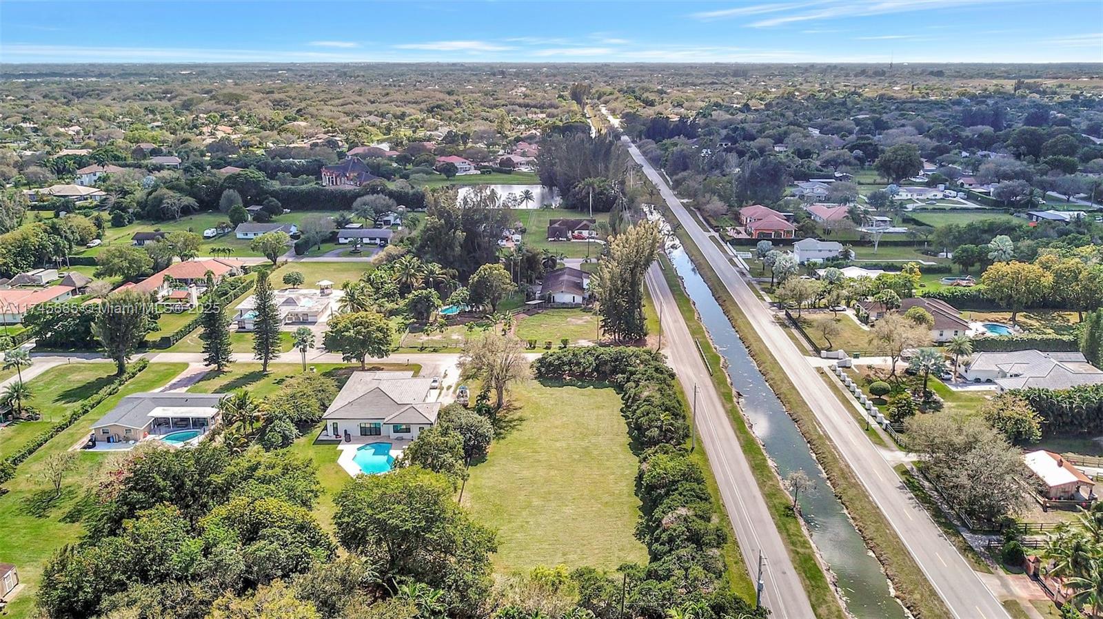 28 Sw Street Davie, FL 33330 - Photo 10 of 11 an aerial view of residential houses with outdoor space