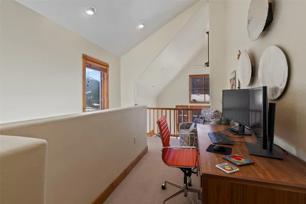a room with furniture and wooden floor