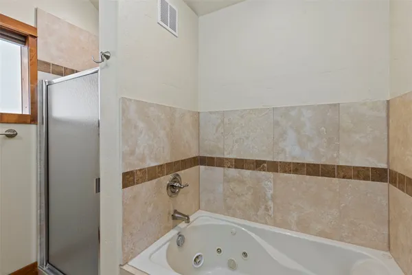 a bathroom with a bathtub