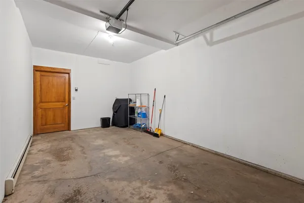 a view of empty room with ceiling fan