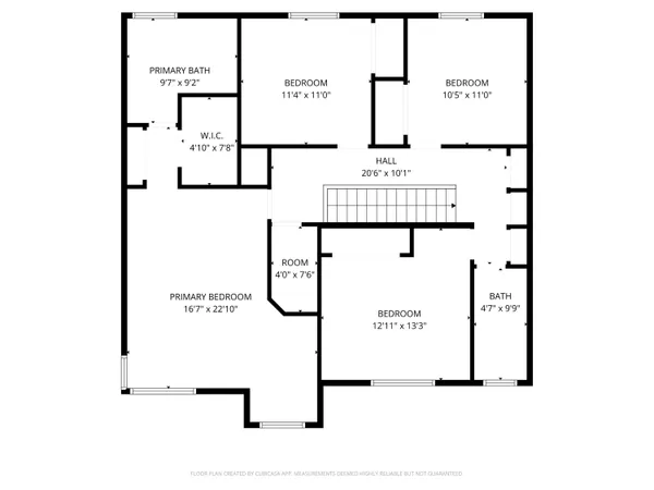 a picture of a bench in front of a wall