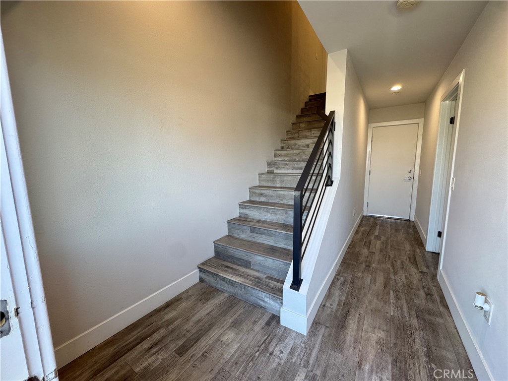 7958 Telegraph Road Downey, CA 90240 - Photo 21 of 38 a view of entryway and hall with wooden floor