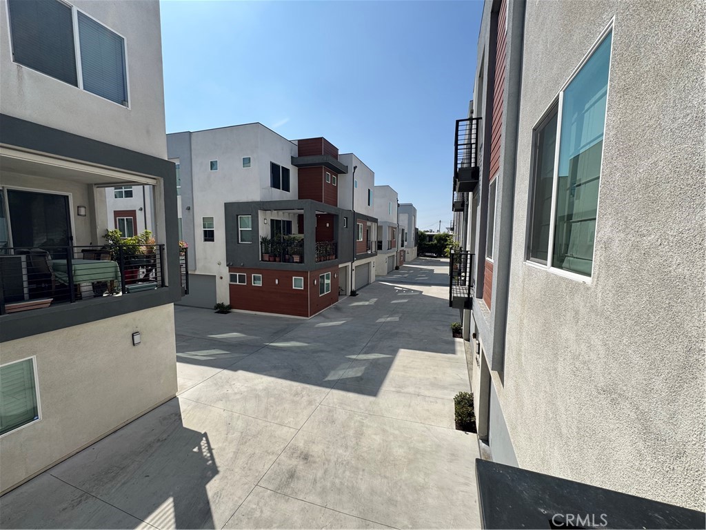 7958 Telegraph Road Downey, CA 90240 - Photo 31 of 38 a living room with furniture and a fireplace