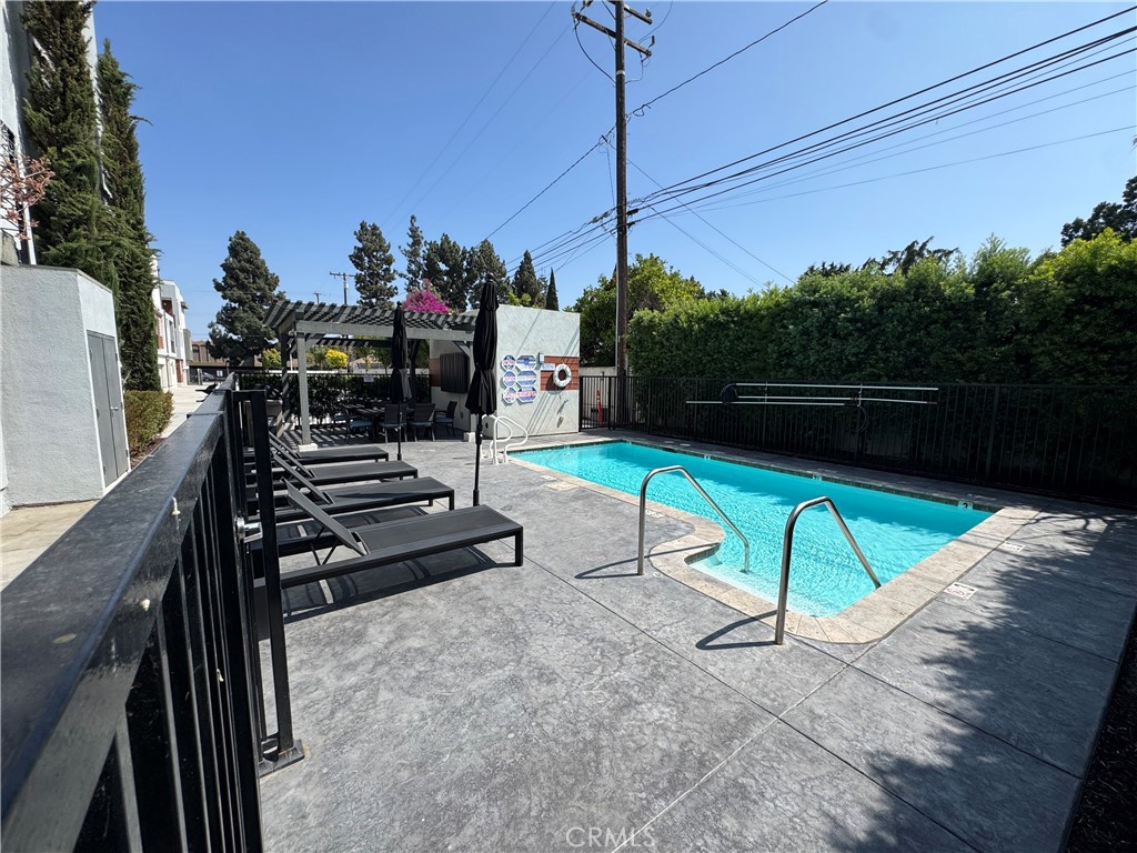 7958 Telegraph Road Downey, CA 90240 - Photo 34 of 38 a view of a swimming pool with a patio