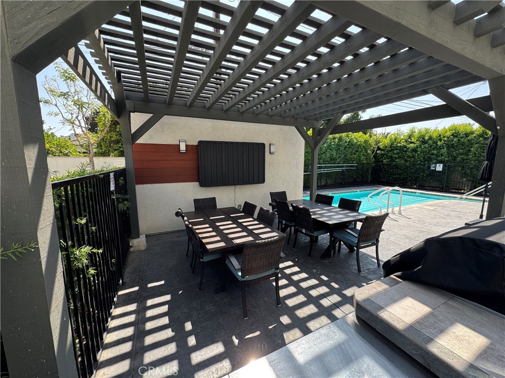 7958 Telegraph Road Downey, CA 90240 - Photo 35 of 38 a outdoor dining space with furniture and garden view