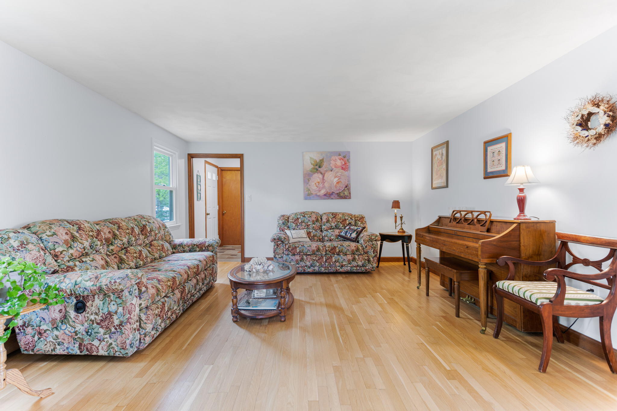 75 Lake Leaman Road Falmouth, MA 02540 - Photo 11 of 30 a living room with furniture and a wooden floor