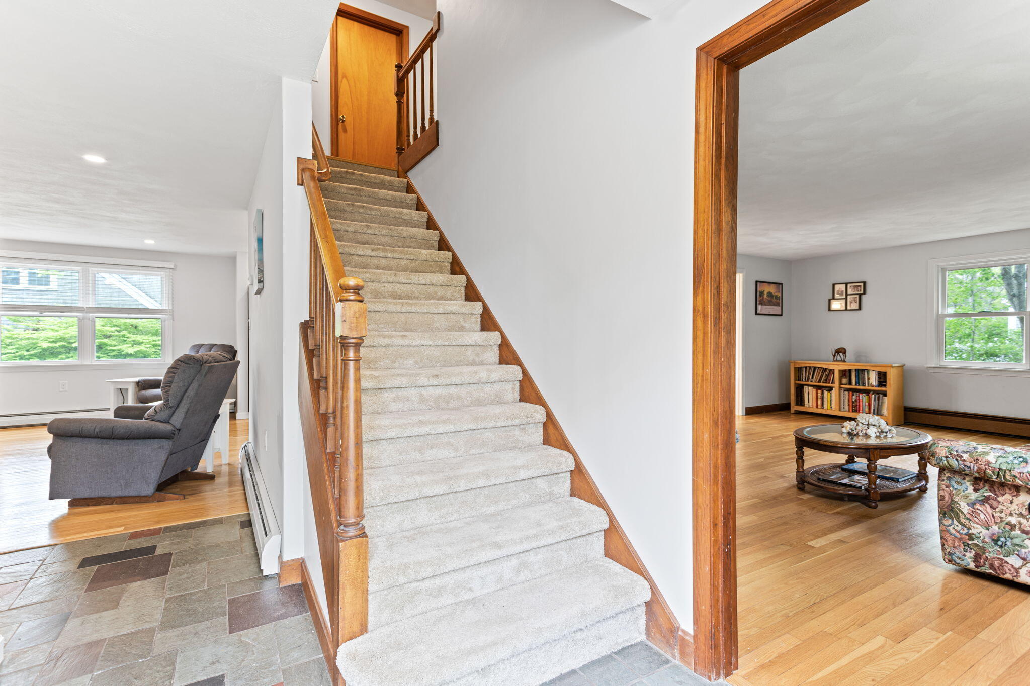 75 Lake Leaman Road Falmouth, MA 02540 - Photo 13 of 30 a view of a hallway with couch and dining room view