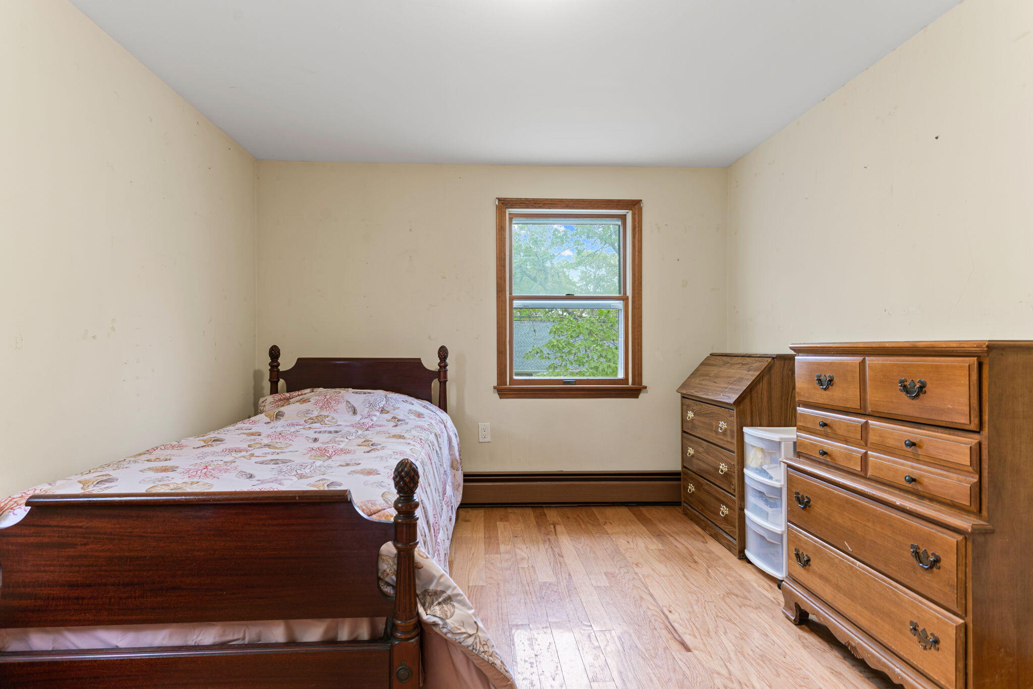 75 Lake Leaman Road Falmouth, MA 02540 - Photo 17 of 30 a bedroom with a bed and a window