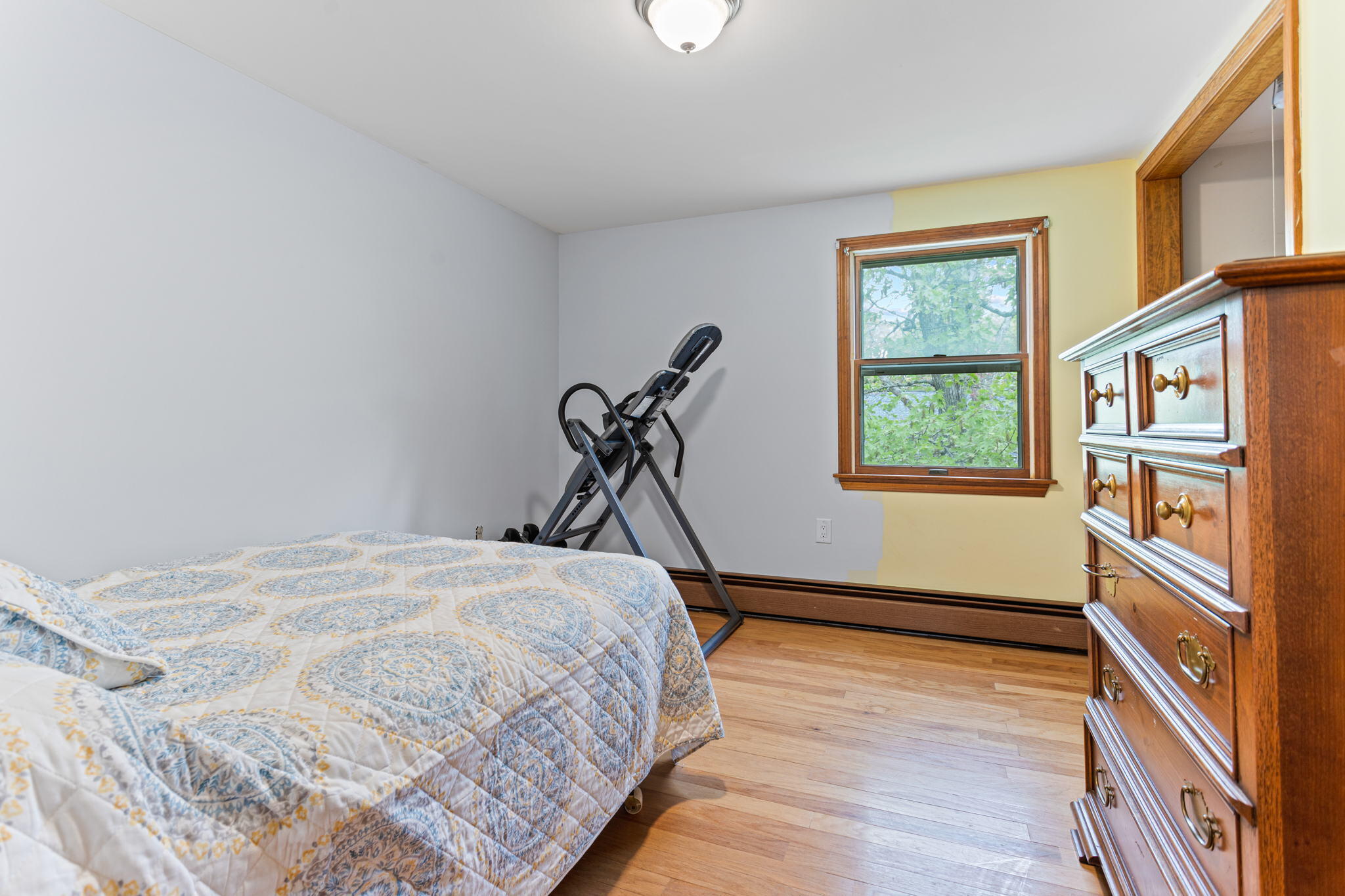 75 Lake Leaman Road Falmouth, MA 02540 - Photo 18 of 30 a bedroom with a bed and a window