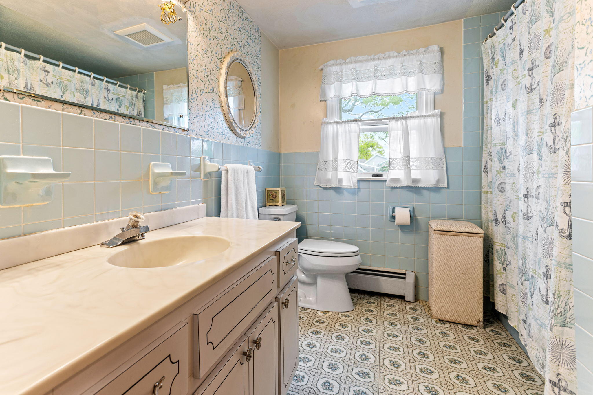75 Lake Leaman Road Falmouth, MA 02540 - Photo 19 of 30 a bathroom with a sink toilet and shower