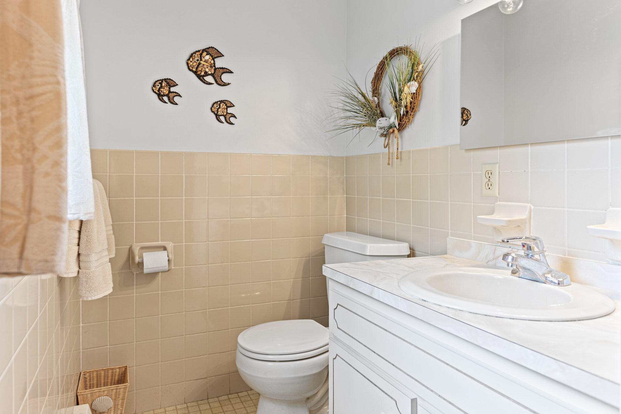 75 Lake Leaman Road Falmouth, MA 02540 - Photo 21 of 30 a bathroom with a sink a toilet and a mirror