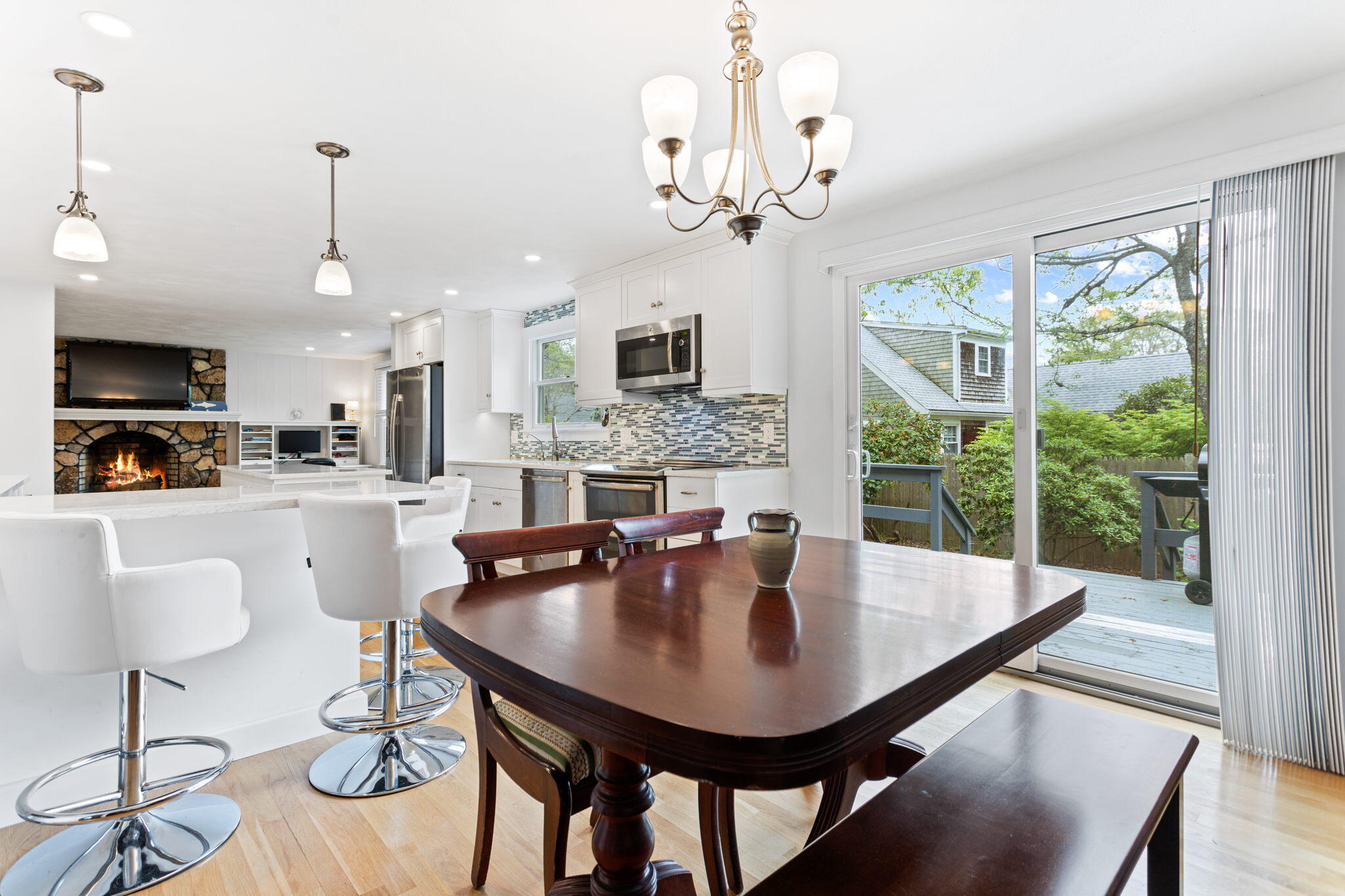 75 Lake Leaman Road Falmouth, MA 02540 - Photo 9 of 30 a view of a dining room with furniture window and wooden floor