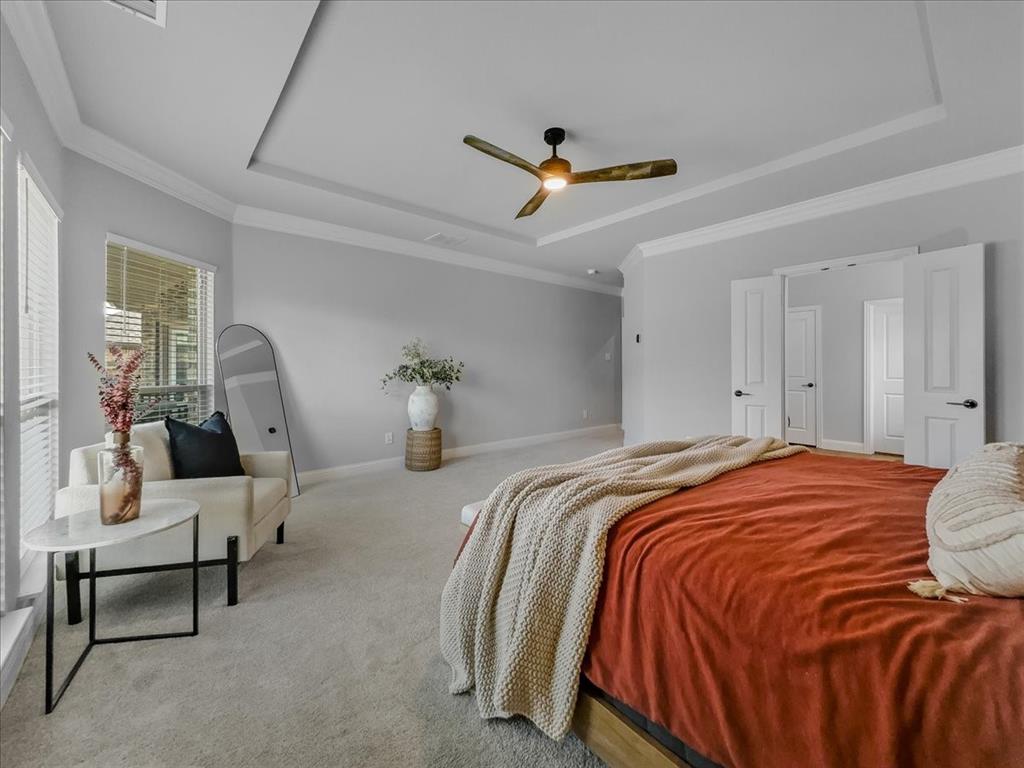 428 Piper Lane Fate, TX 75087 - Photo 13 of 33 Spacious downstairs primary bedroom