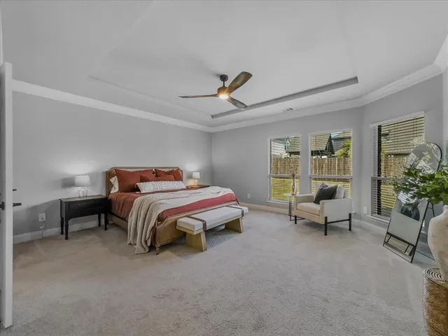 a bed room with a bed and a couch