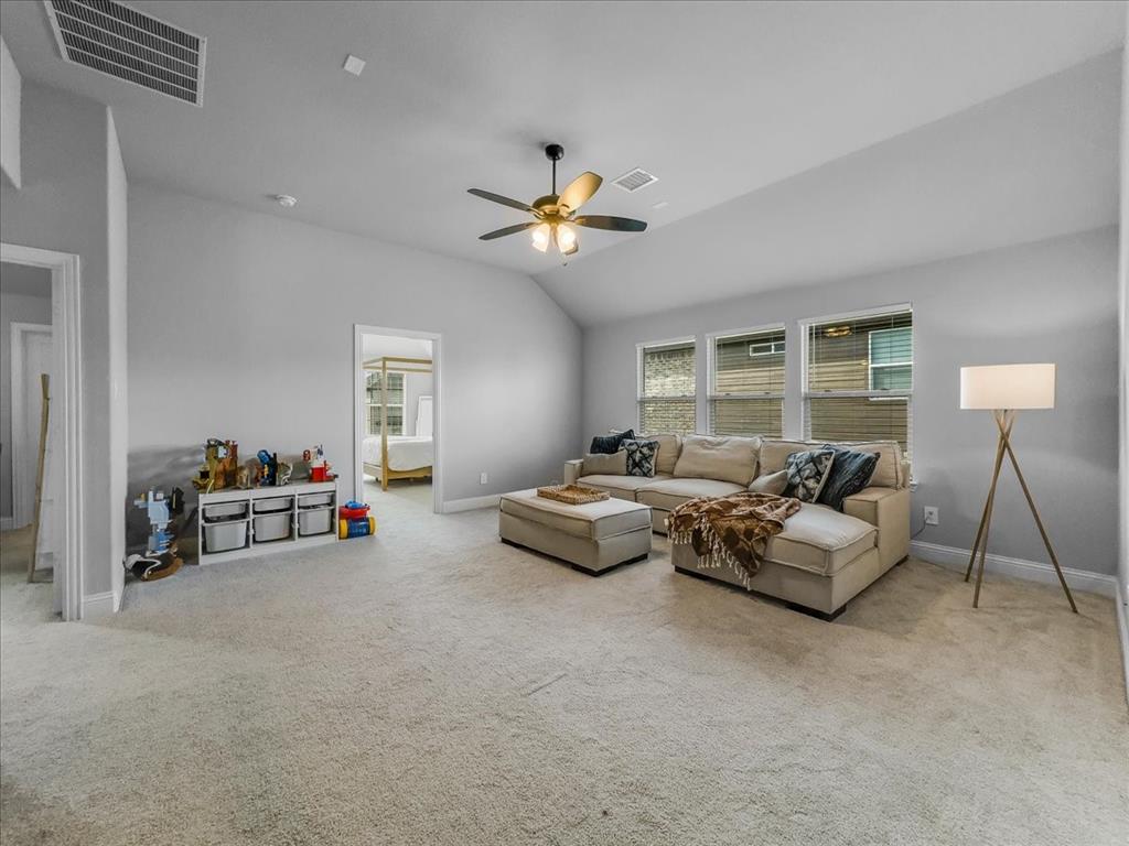 428 Piper Lane Fate, TX 75087 - Photo 18 of 33 Versatile upstairs space suited for entertainment or relaxation