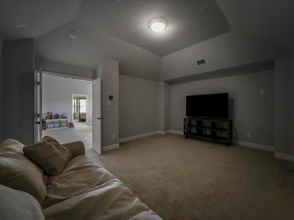 428 Piper Lane Fate, TX 75087 - Photo 19 of 33 Entertainment-ready media room with built-in wet bar