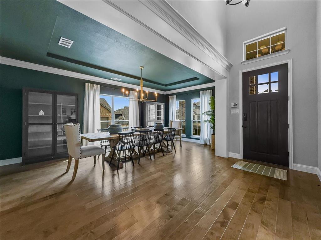 428 Piper Lane Fate, TX 75087 - Photo 2 of 33 Welcoming entry with an open, generously sized dining area