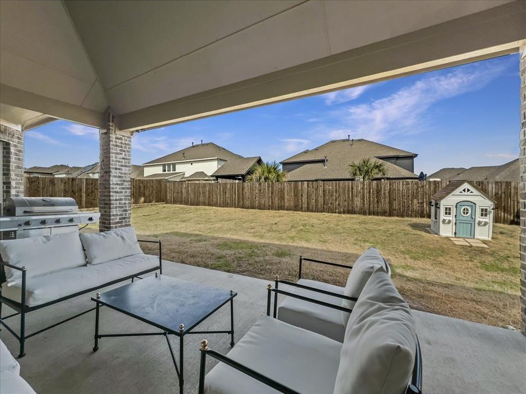 428 Piper Lane Fate, TX 75087 - Photo 27 of 33 Outdoor covered patio with built-in speaker wiring