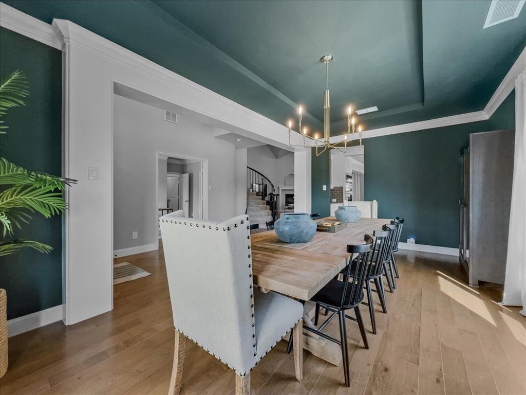 428 Piper Lane Fate, TX 75087 - Photo 3 of 33 Bright, open dining room offering flexibility for gatherings
