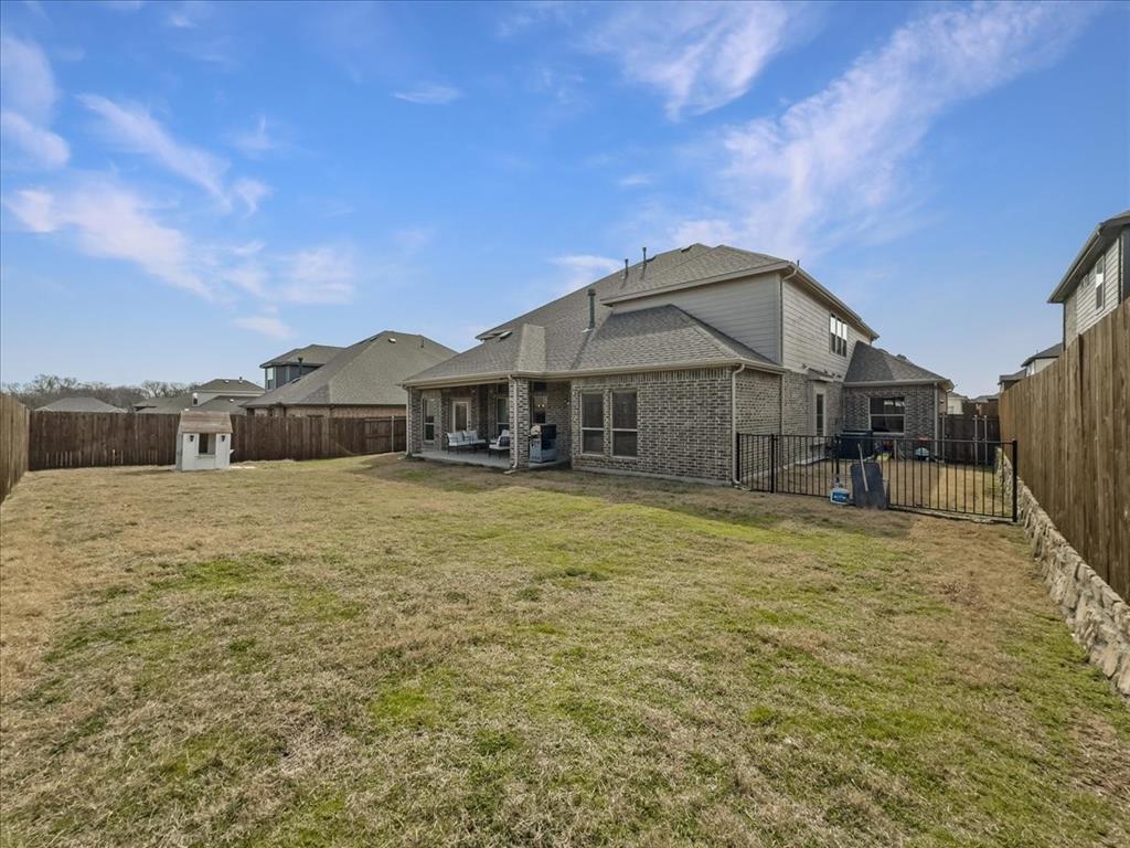 428 Piper Lane Fate, TX 75087 - Photo 30 of 33 Backyard provides plenty of space for future possibilities