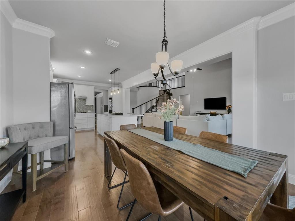 428 Piper Lane Fate, TX 75087 - Photo 8 of 33 Open eat-in kitchen with ample space for gatherings