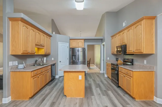a bathroom with a sink a mirror and a bathtub