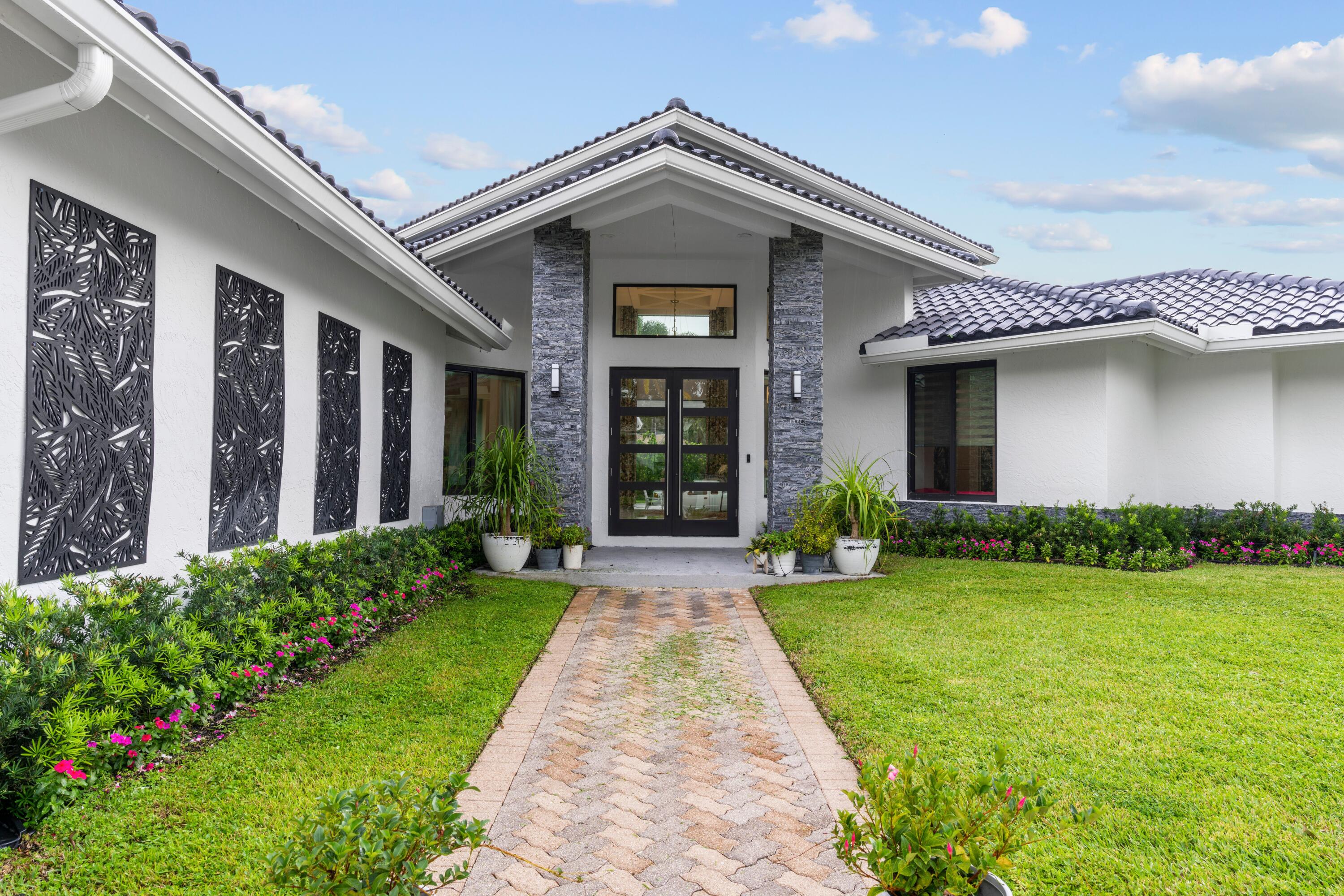 5867 Northwest 23rd Terrace Boca Raton, FL 33496 - Photo 2 of 40 _sk-Eakq