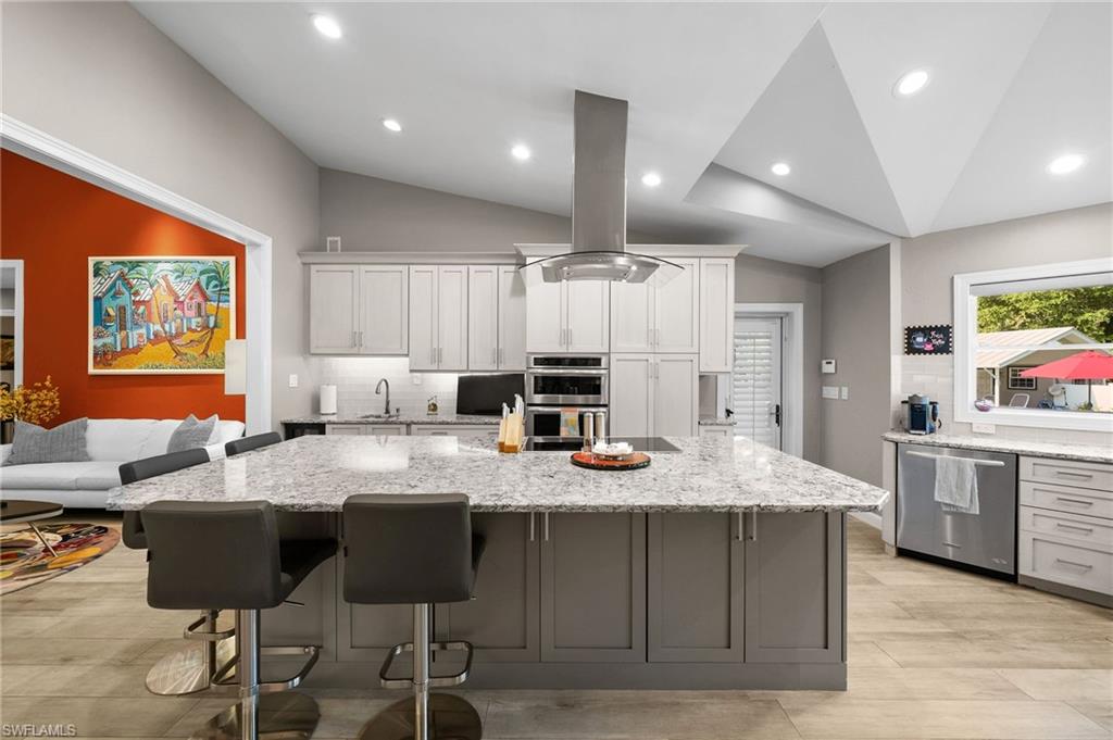 153 West Street Naples, FL 34108 - Photo 19 of 48 a large kitchen with granite countertop lots of counter top space