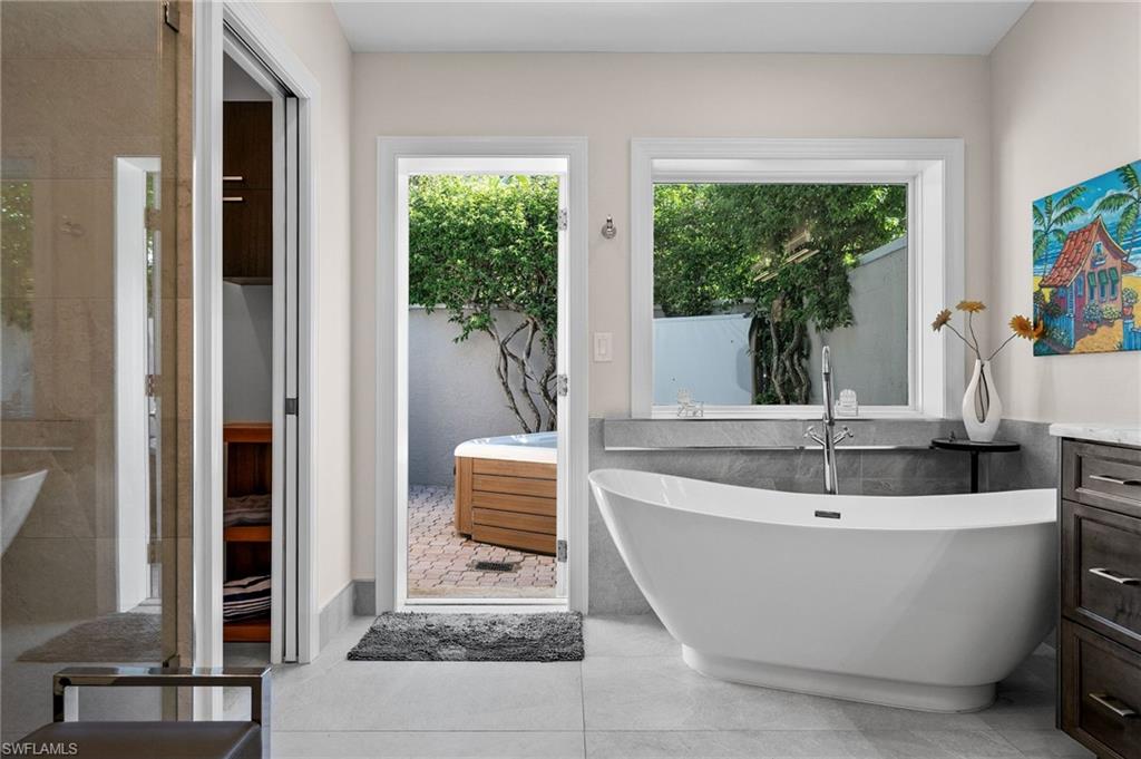 153 West Street Naples, FL 34108 - Photo 23 of 48 a view of a bathtub in a room