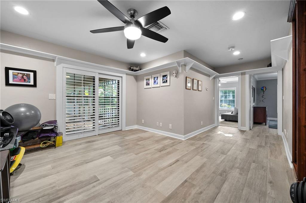 153 West Street Naples, FL 34108 - Photo 28 of 48 a view of livingroom with workspace