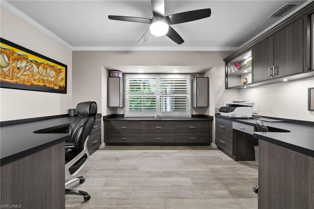 153 West Street Naples, FL 34108 - Photo 30 of 48 a kitchen with a stove and a window